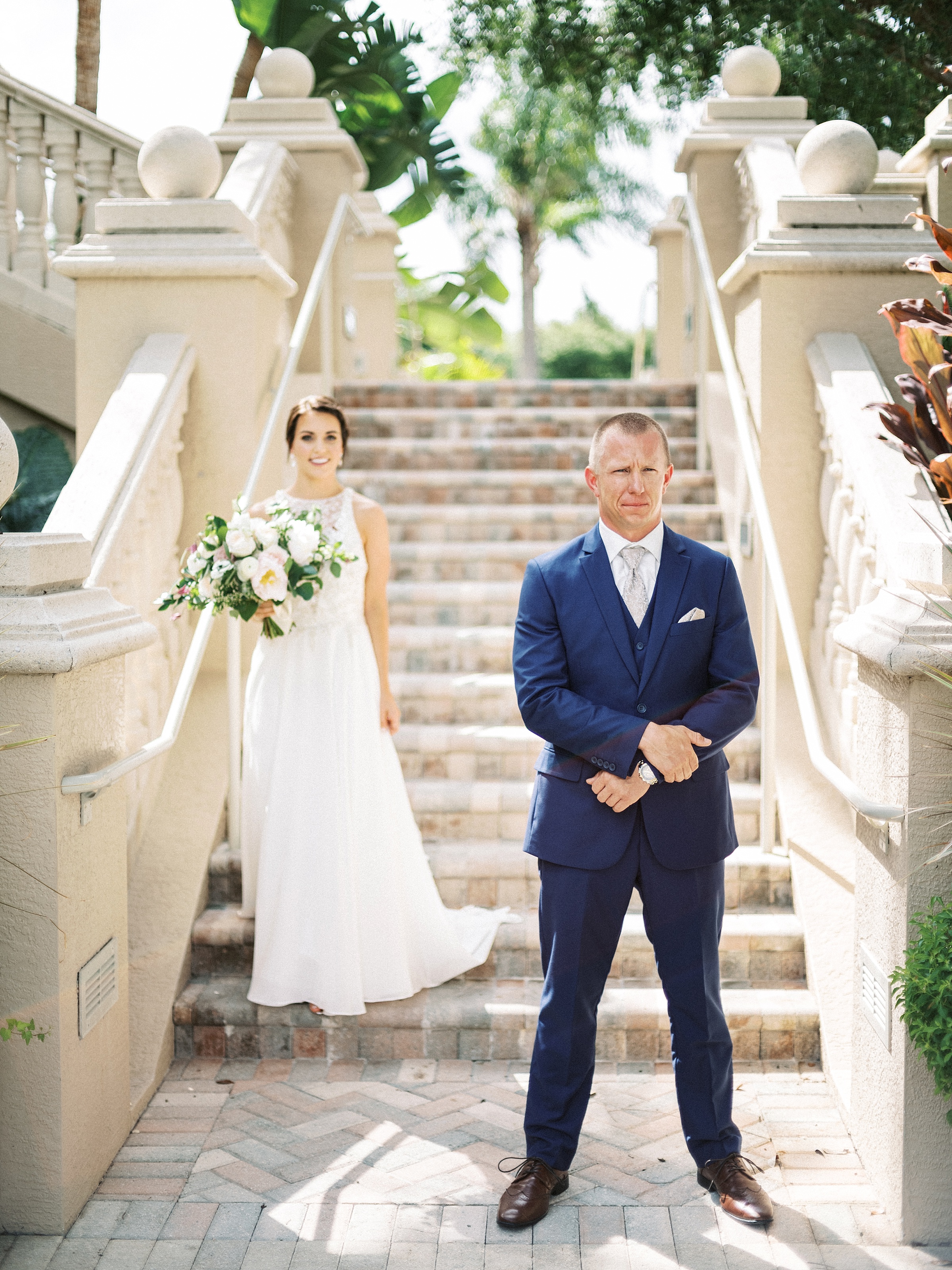 Club at the strand naples wedding, the strand naples wedding, naples wedding photographer, first look photo on stairs 