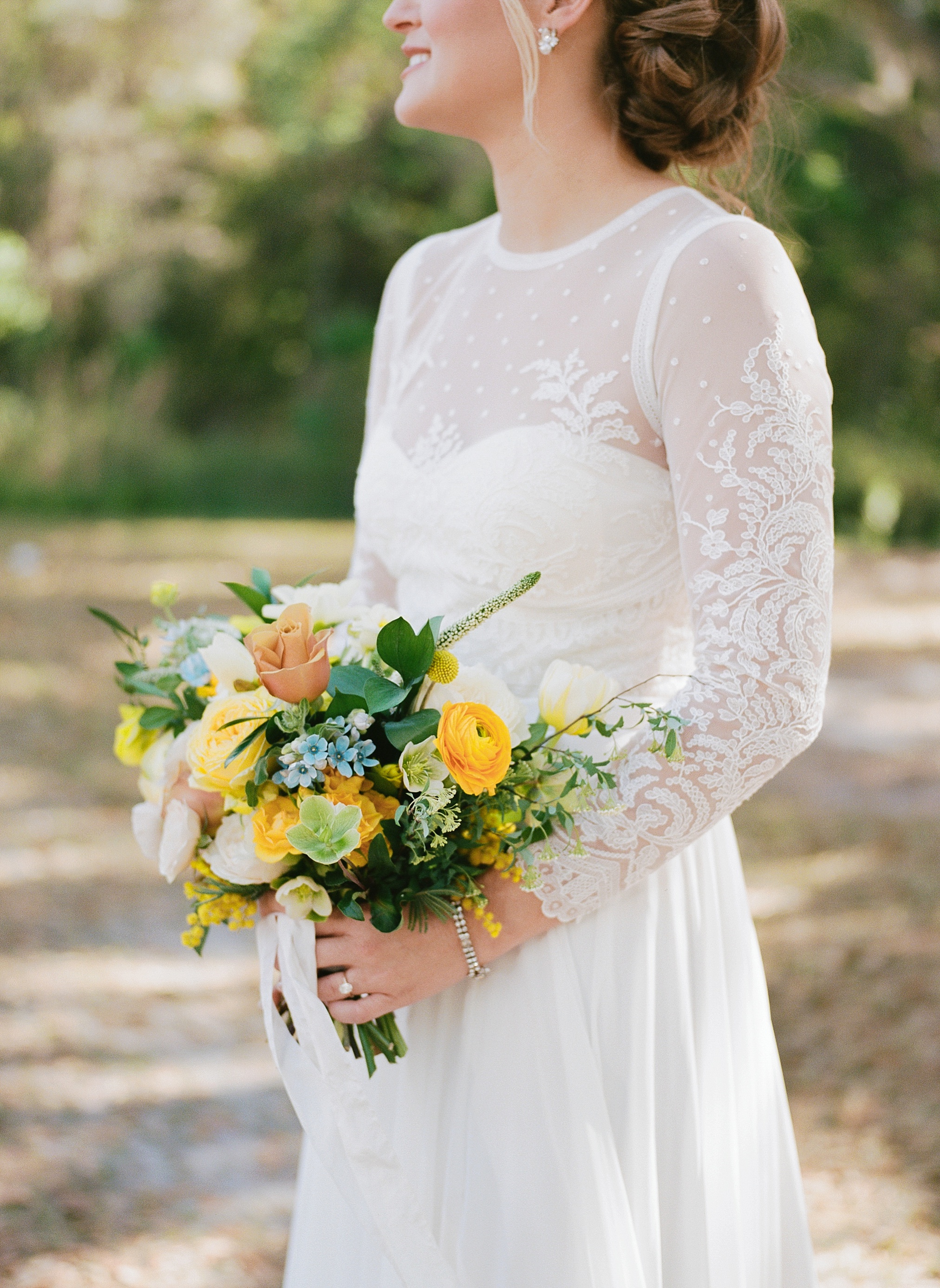 Lakeland Wedding at Haus 820, portrait of bride and groom with beautiful yellow florals 