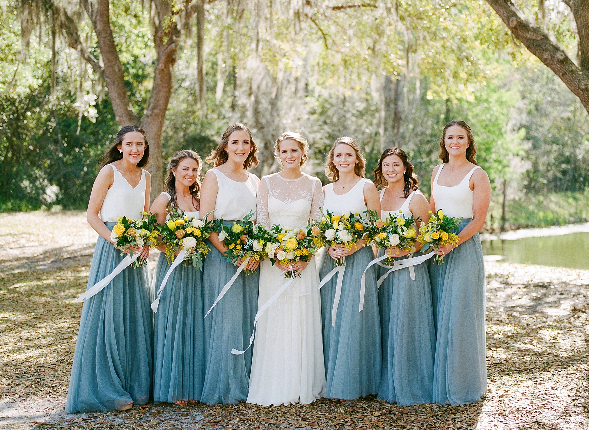 Blue bridesmaid skirts with yellow florals, Haus 820 Wedding
