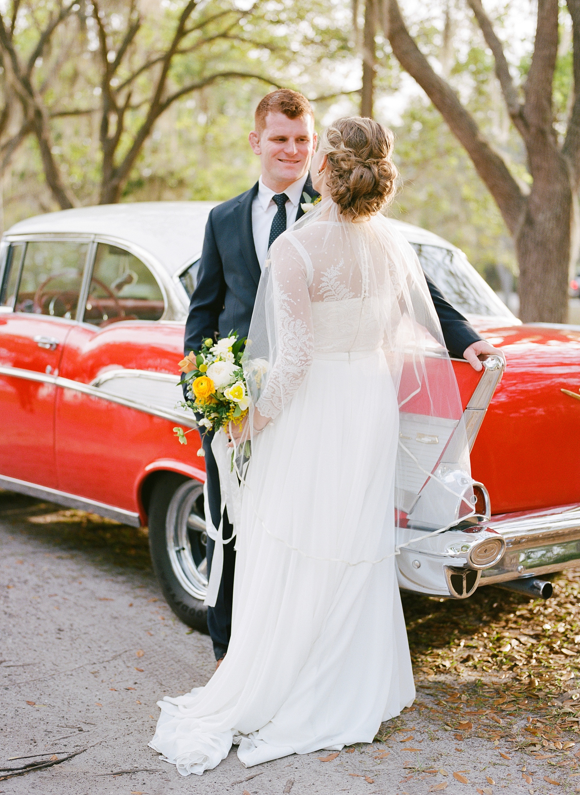 Chevy Bel Air wedding photo with bride and groom in Lakeland, Florida
