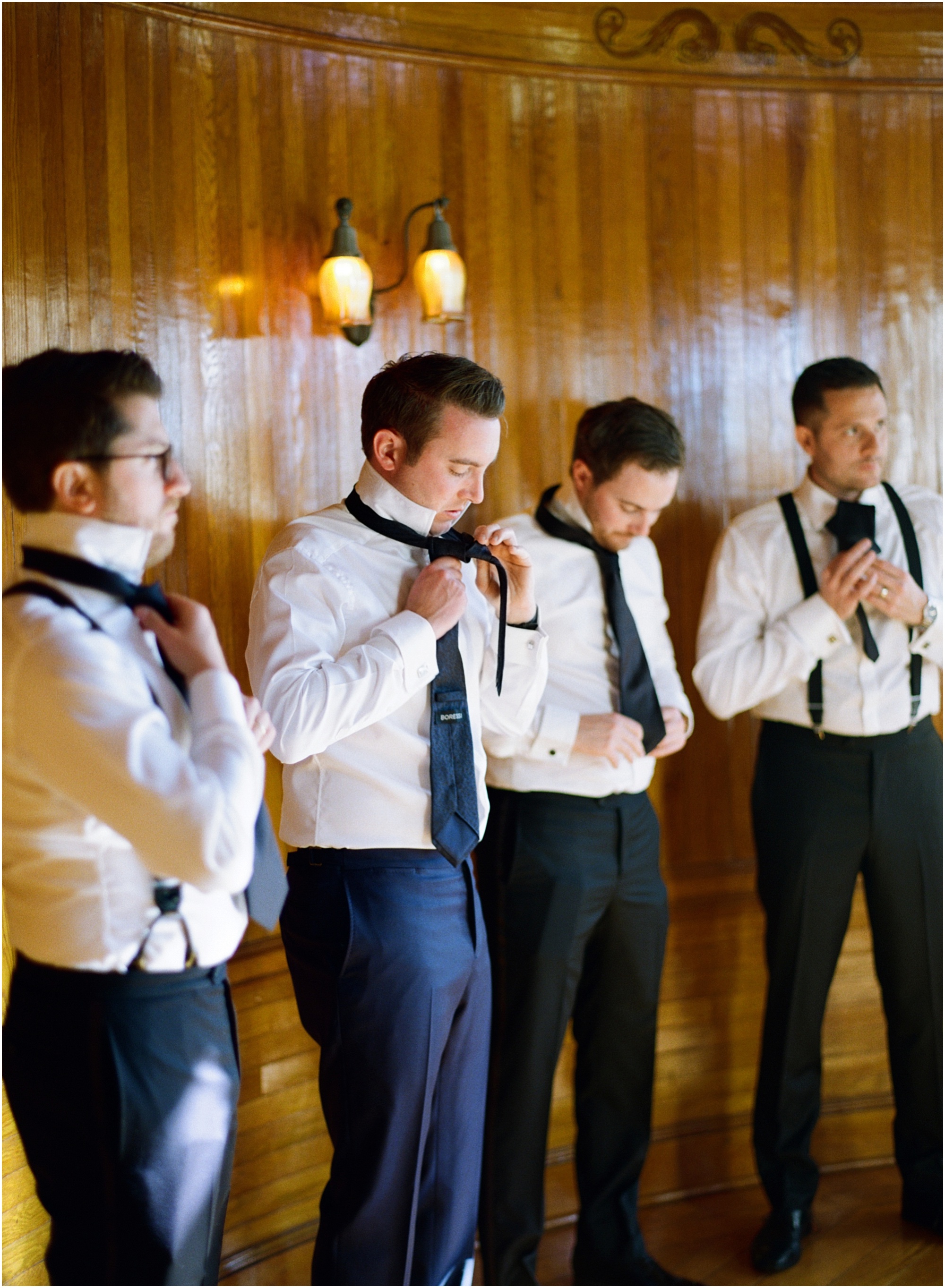 Wedding Photography at The Powel Crosley Estate in Sarasota, Florida, Guys getting ready in the ship room
