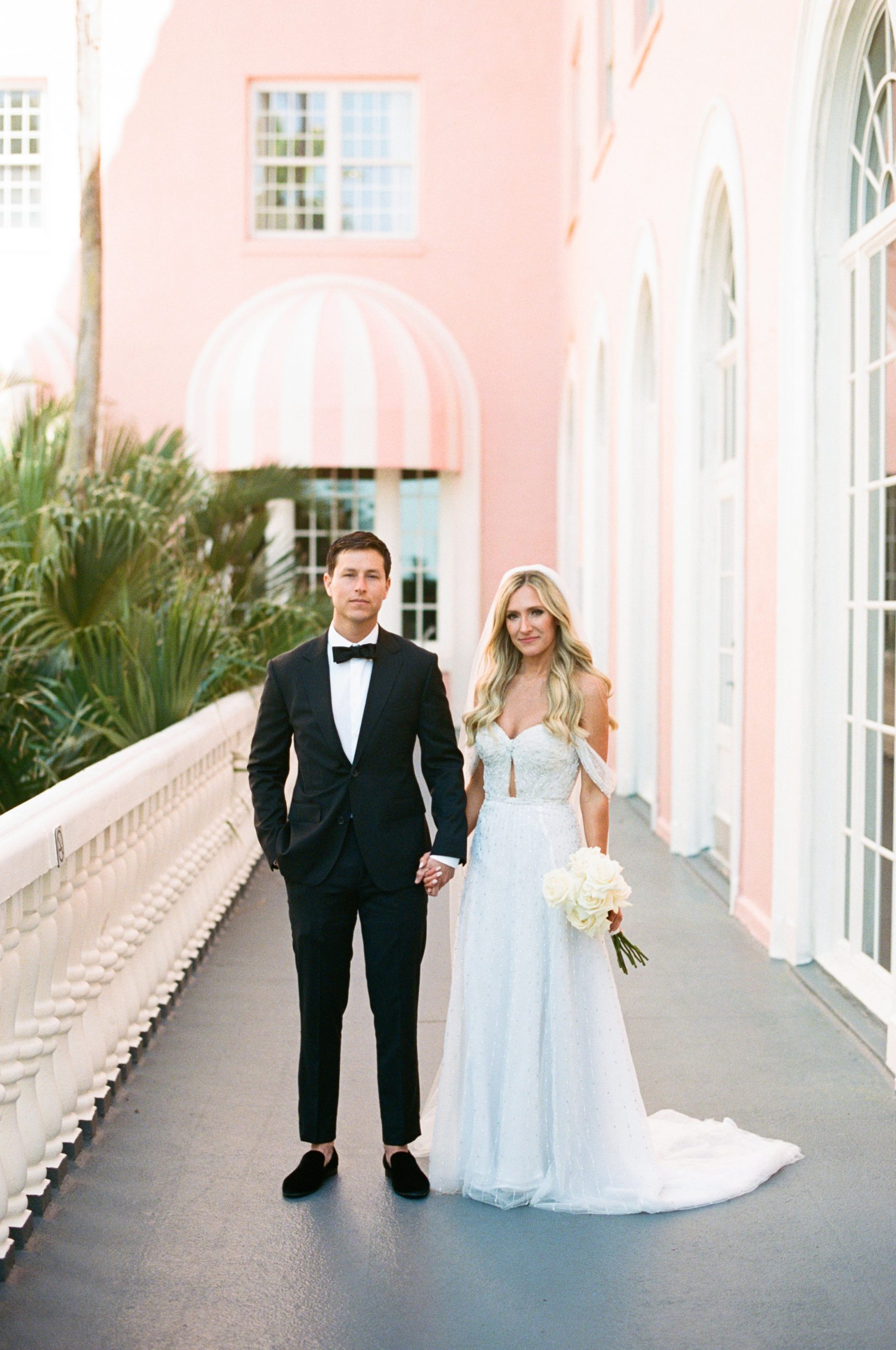 modern and elegant wedding photo of bride and groom at the don cesar hotel 